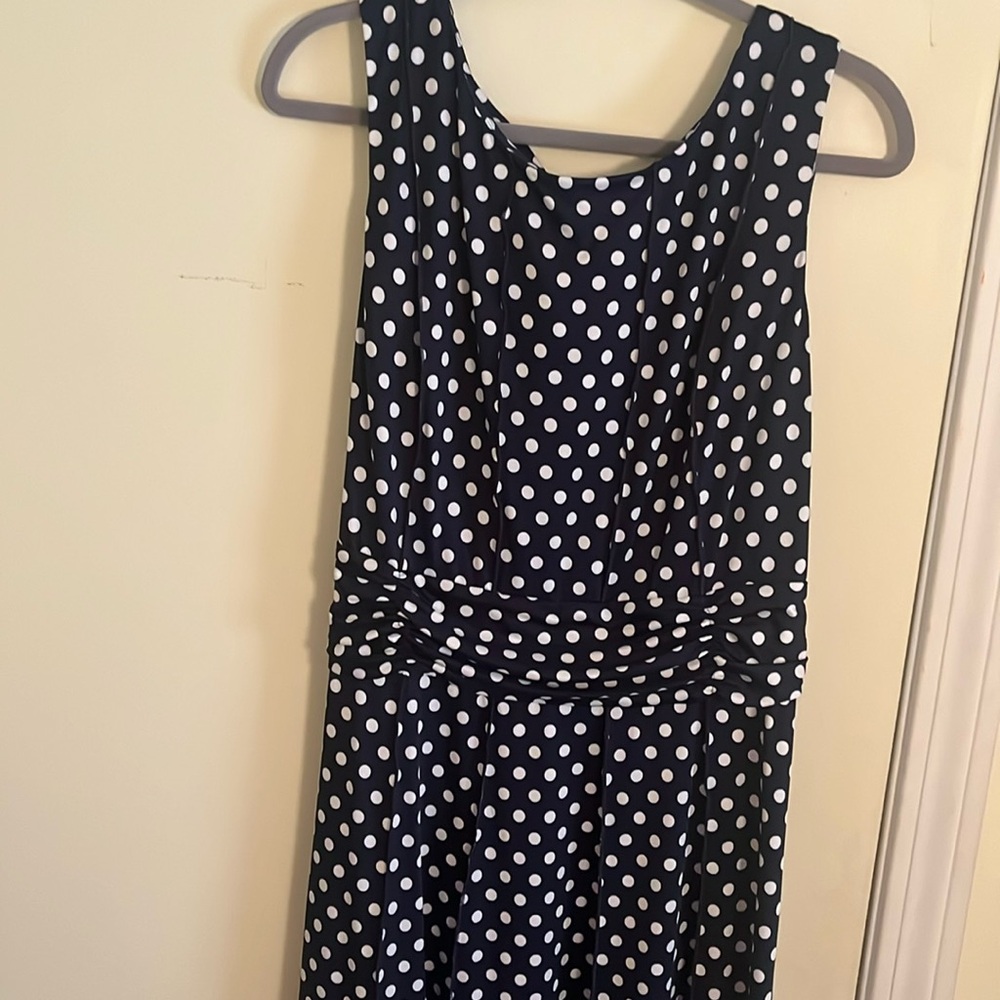 Flattering  navy dress with white polka dots